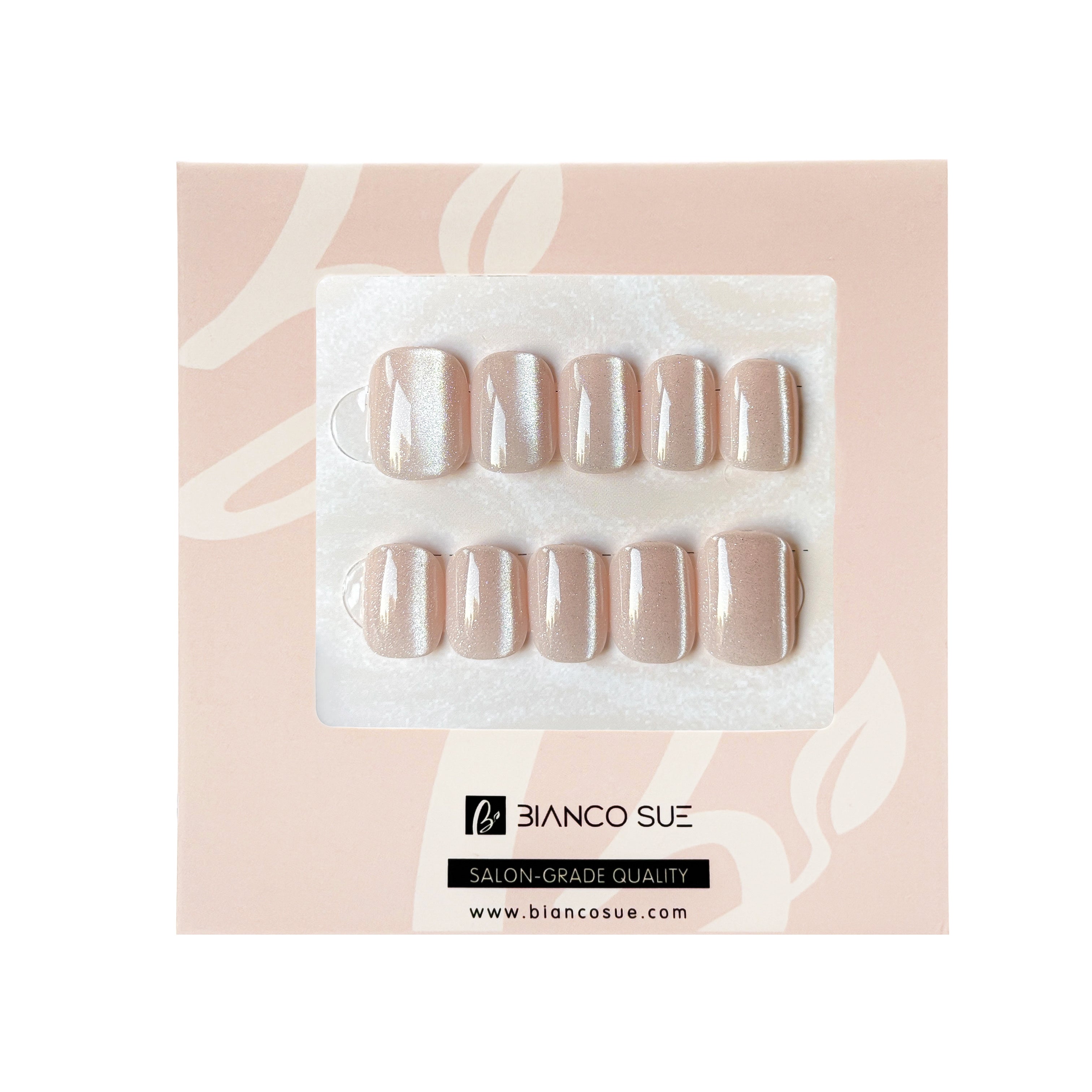 Rosy Mist extra short squoval press-on nails kit with pink cat-eye finish, offering a delicate and refined manicure.