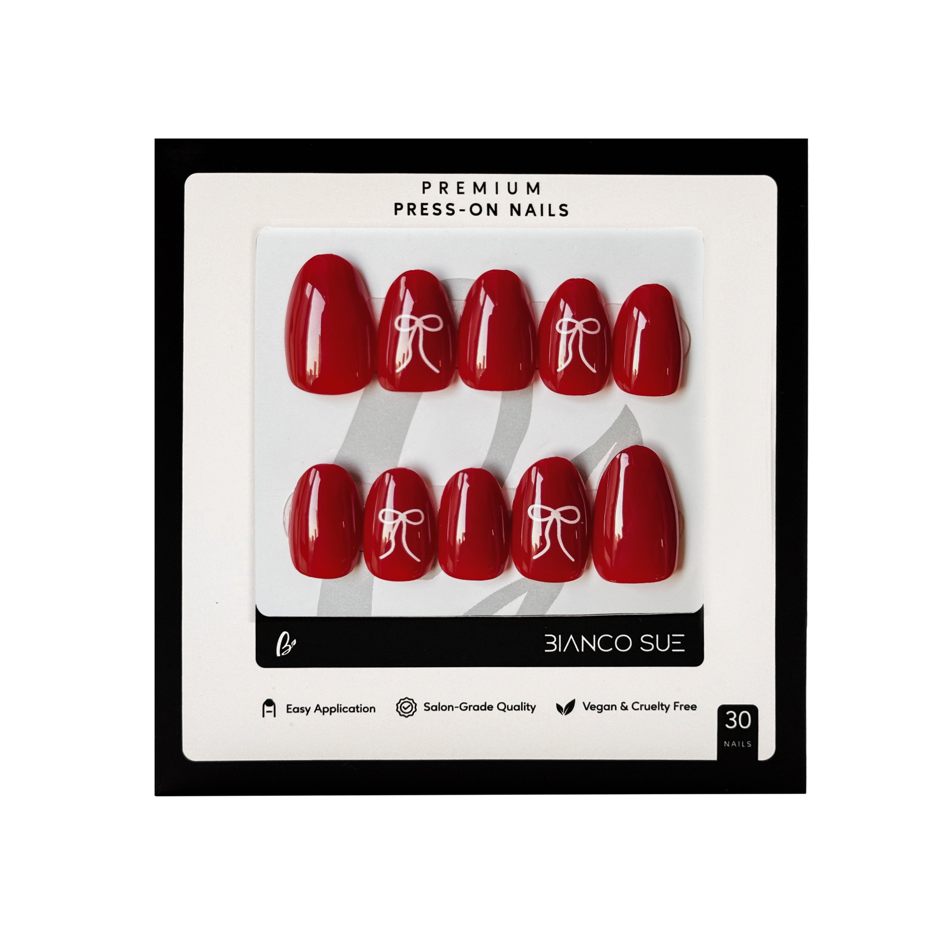 "Cherry Tied Short Round Red with Bow Accents Press-On Nails Kit – Bold and playful, these short round nails come in a vibrant red shade, adorned with charming bow accents for a cute, fashionable look. Perfect for adding a fun pop of color and personality to your nails, this easy-to-apply kit delivers a flawless, attention-grabbing manicure in minutes."