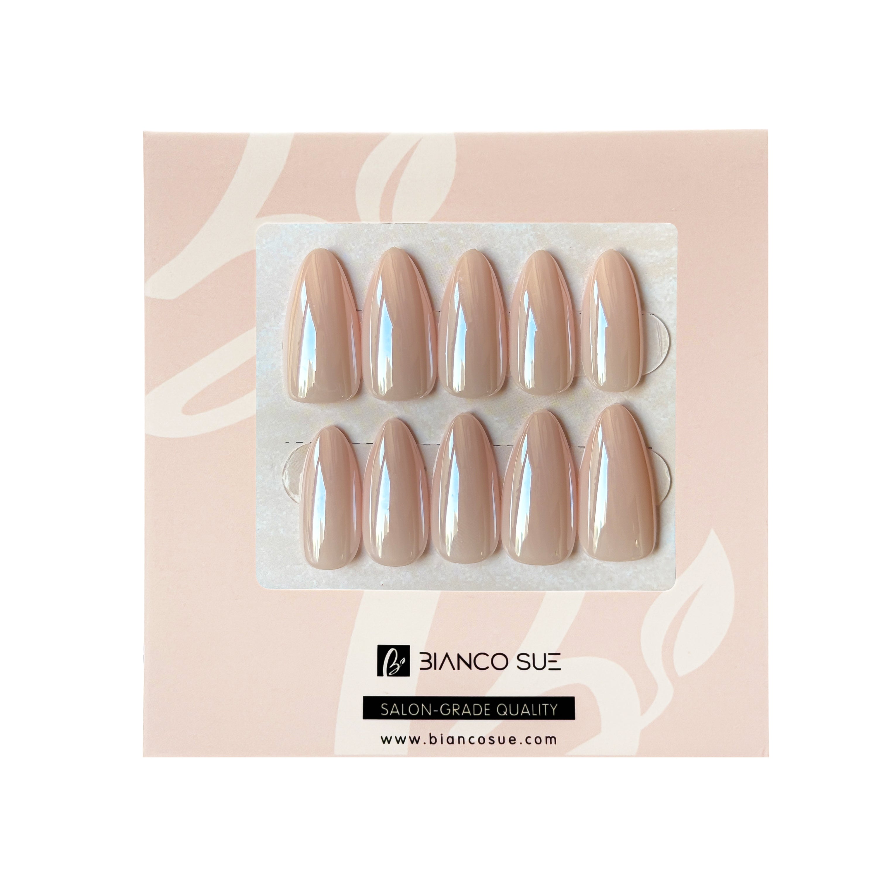 "Hailey's Medium Almond Pink Press-On Nails Kit – Soft, elegant, and effortlessly chic, this kit features medium almond-shaped nails in a delicate pink shade. Perfect for any occasion, these press-ons offer a polished, feminine look in minutes, with a long-lasting finish that’s both easy to apply and remove."