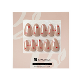 Sweetheart – Super Short Almond Shape | Press-on Nails with Red Hearts on Sheer Nude Base Design Name: Sweetheart — Press-on Nails