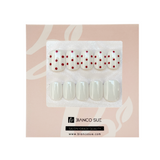 Rose Pebble – Extra Short Squoval Shape | Salon Quality Press-on Nails Kit – Soft White with Red Dots